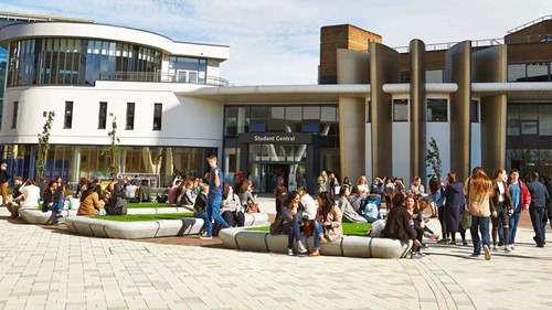 Students sat outside of university